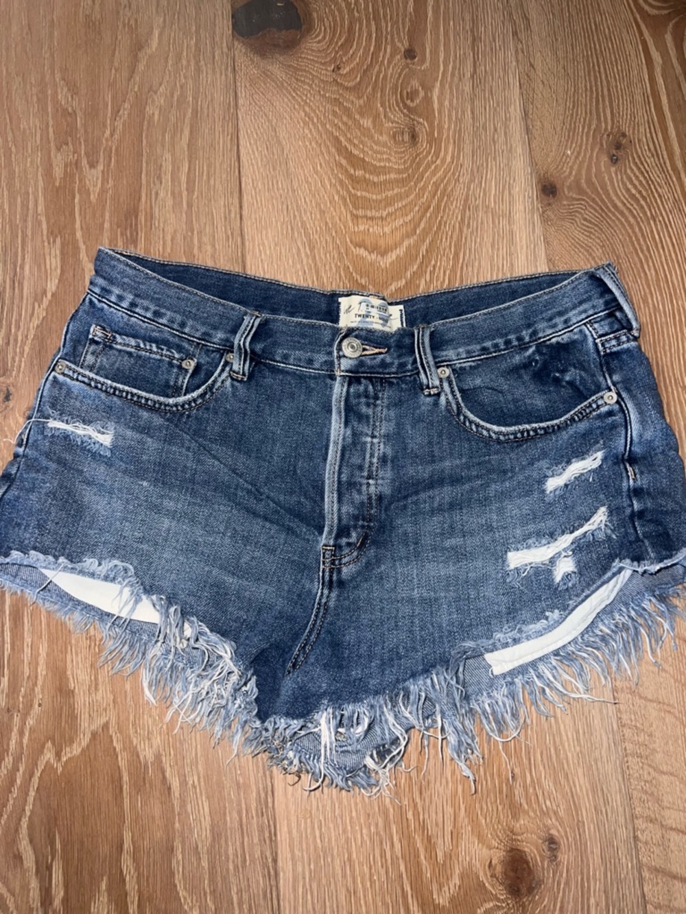We The Free Dark Blue Distressed Denim Cutoff Shorts